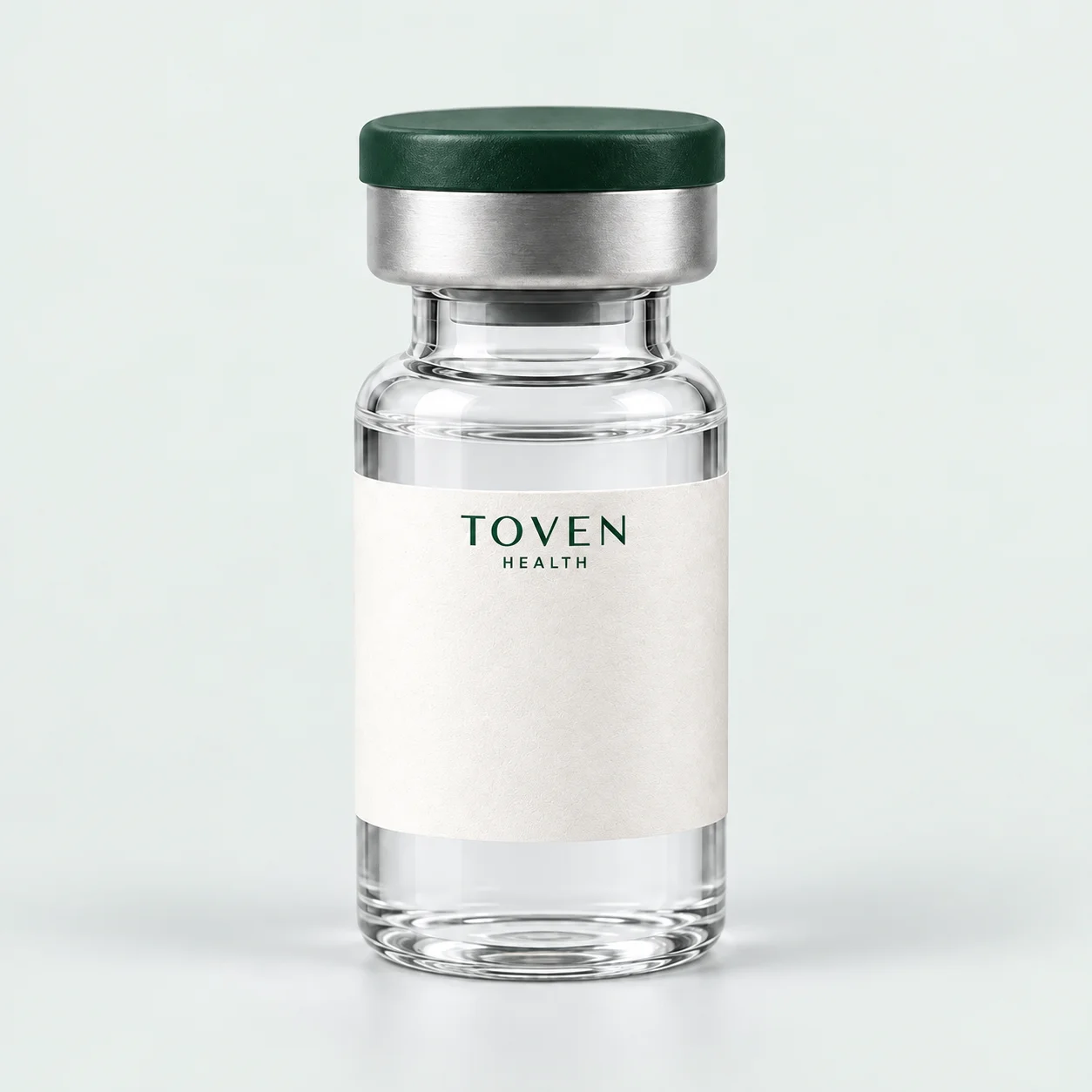 Illustrative Toven Health prescription vial with green cap and branded label